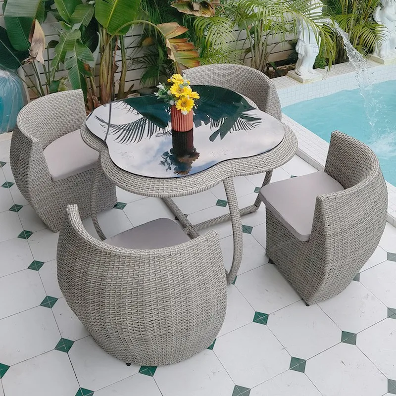 مجموعة طاولة وكراسي من الروطان - مراجعة Outdoor Furniture Store وسعره